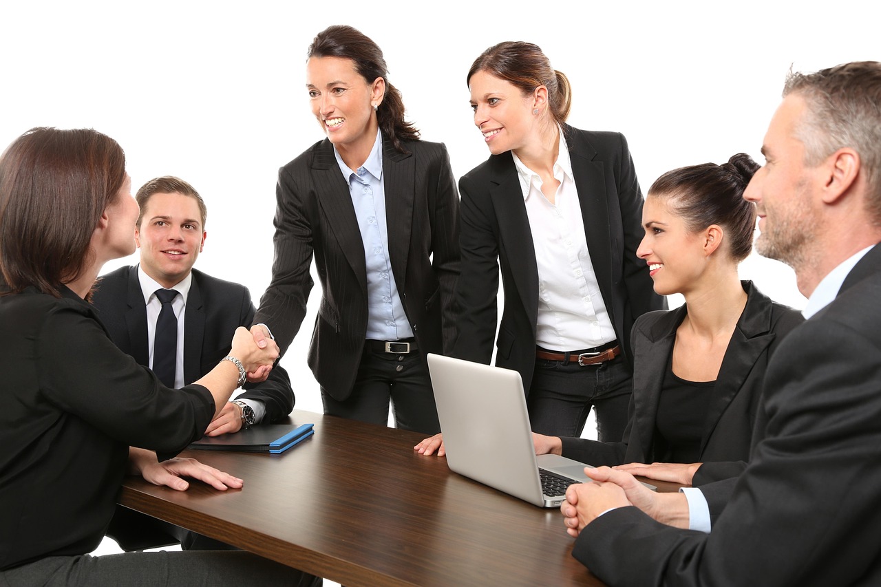 Business owner reviewing financials with their JJ&A advisor